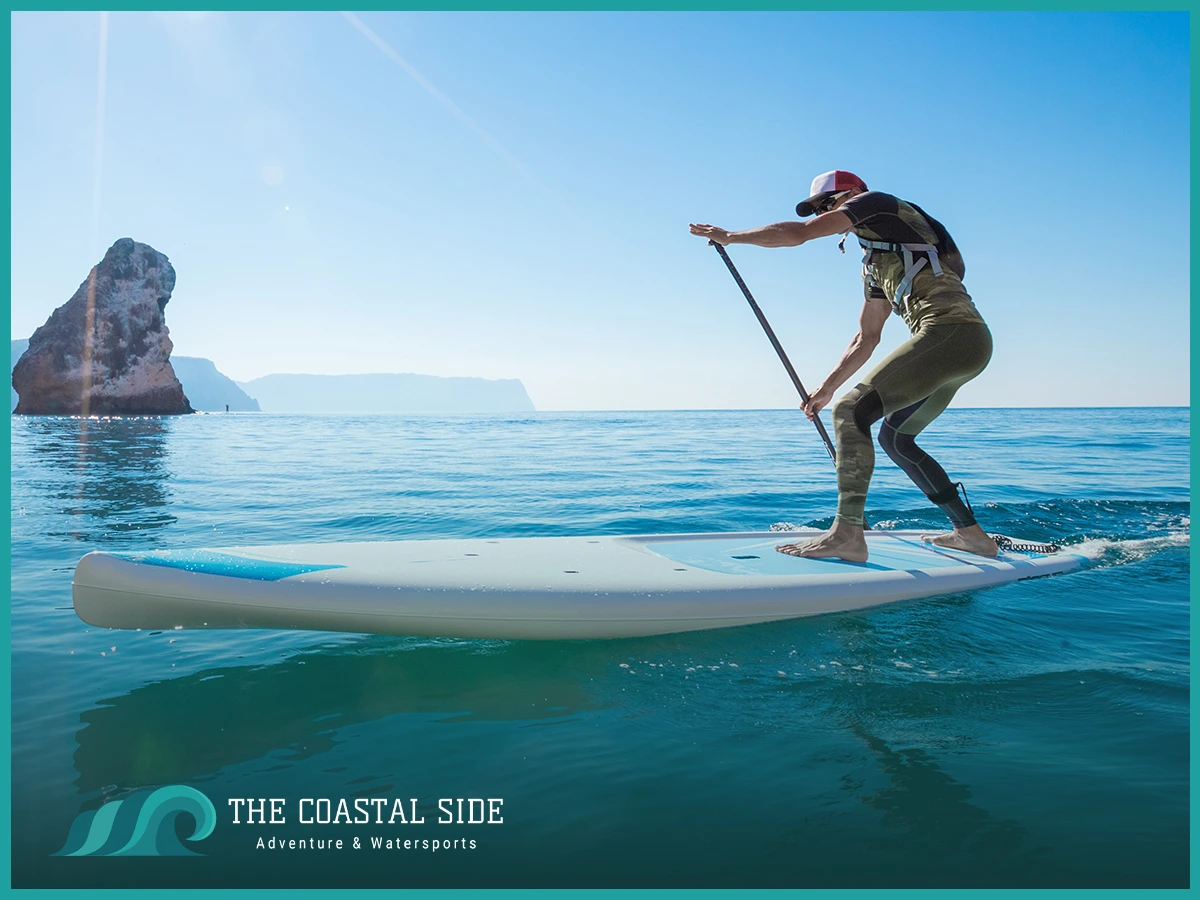 Man paddling on a stand up paddle board