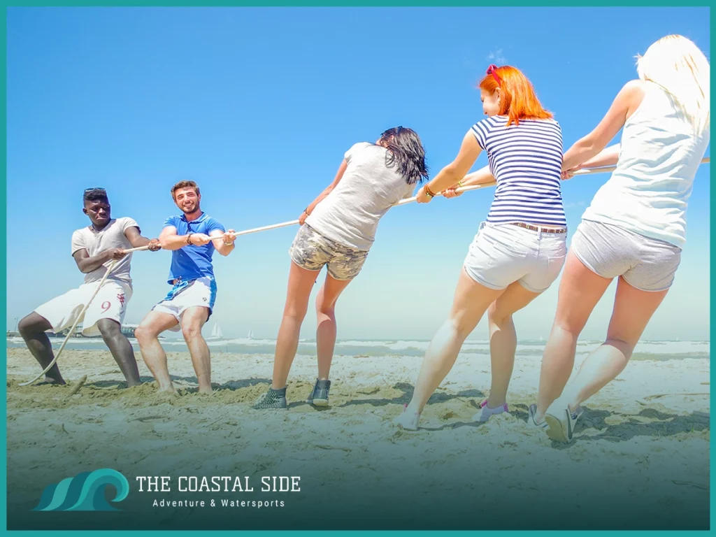 Tug of war on the beach in the sun