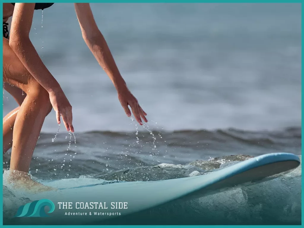 Man giving a shaka from the ocean water