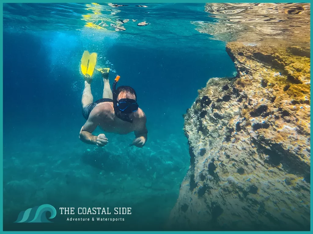 Man snorkeling in deep water in south carolina