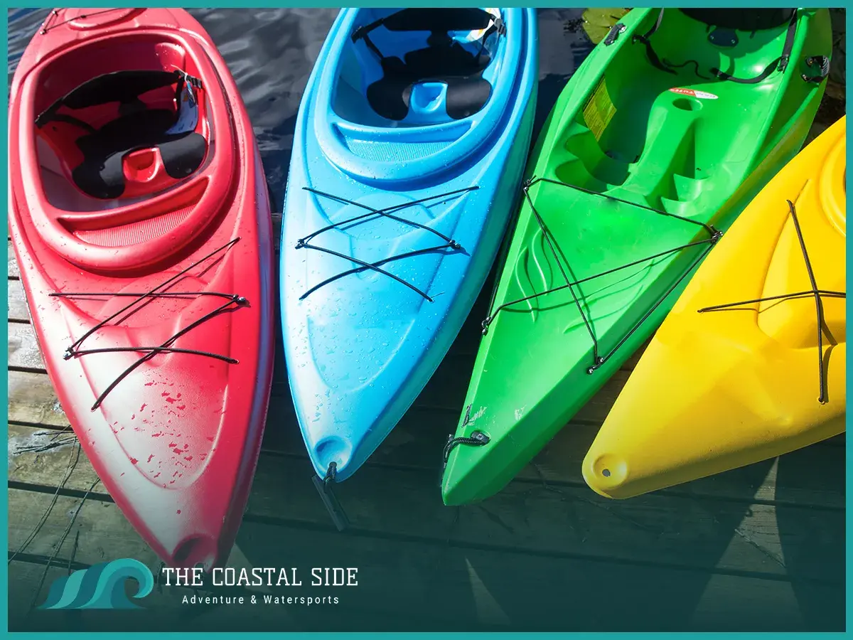 A red, blue, green and yellow kayak