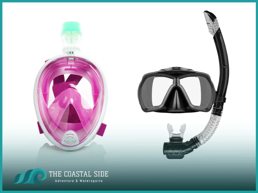 A full face snorkel mask next to a snorkel and goggels