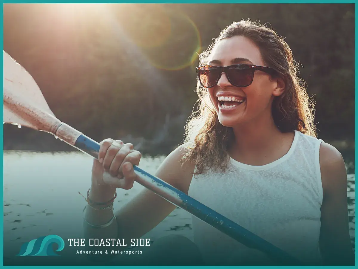 A woman kayaking in the sun