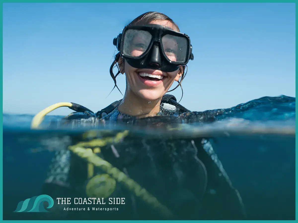 Woman wearing a scuba diving mask and smiling