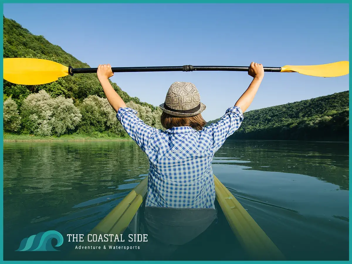 A pregnant woman kayaking safely