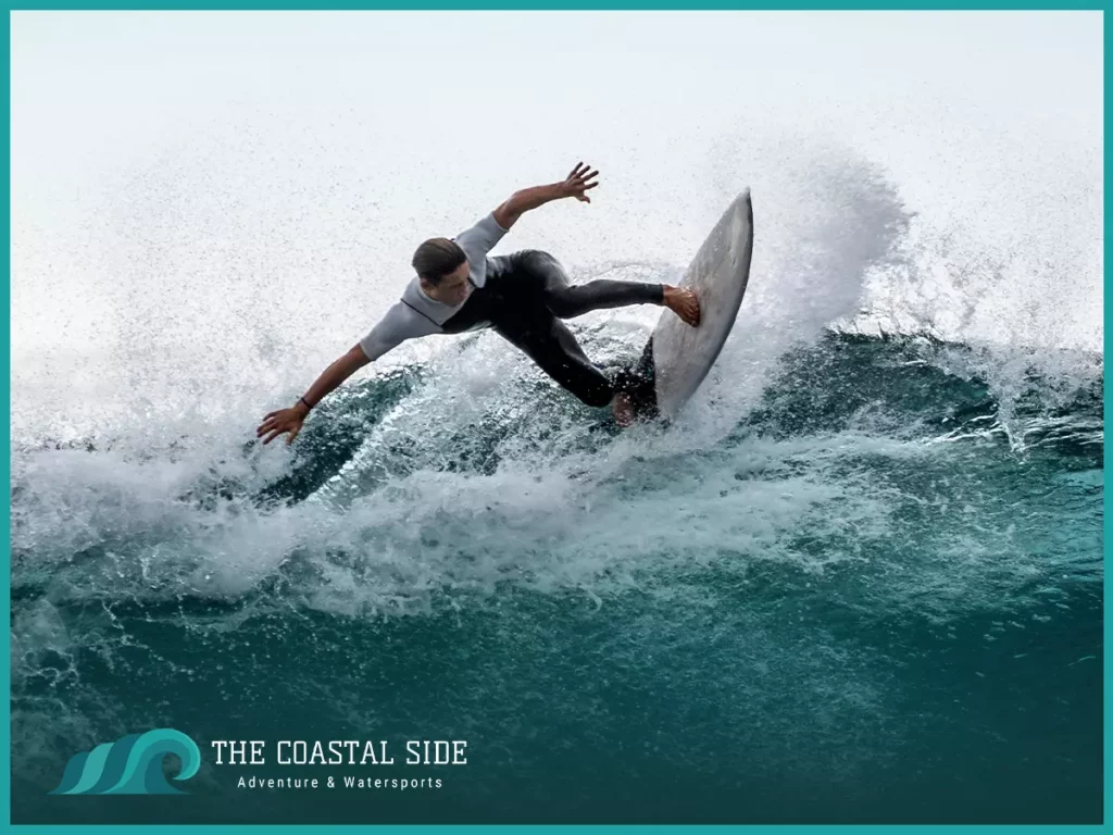 Surfer wiping out on his board