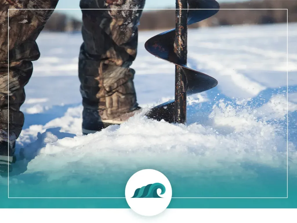 Ice fishing in extreme cold auger