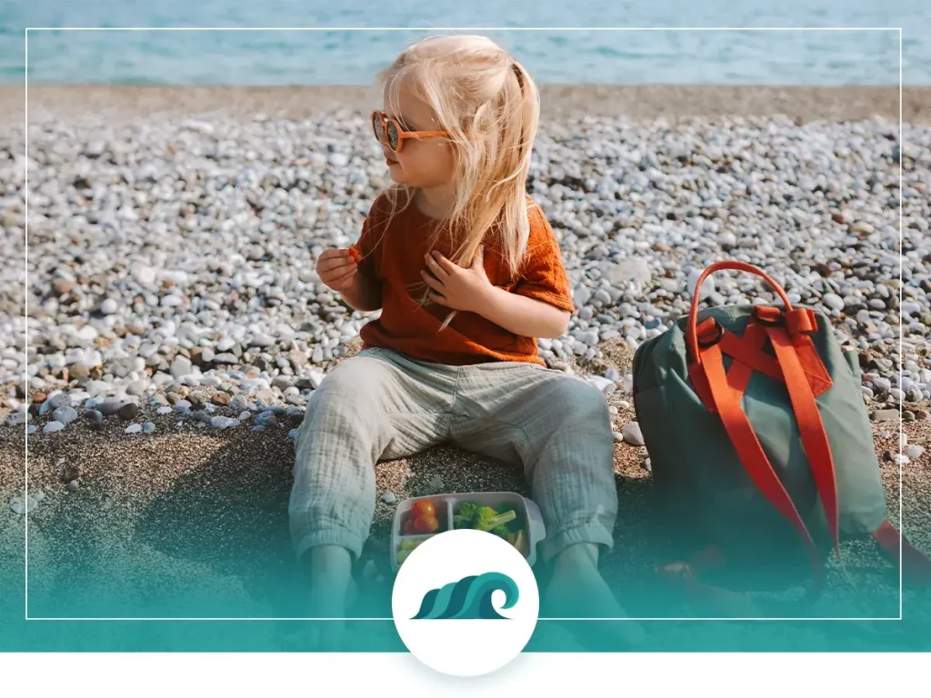 Eat snacks at the beach while listening to the waves