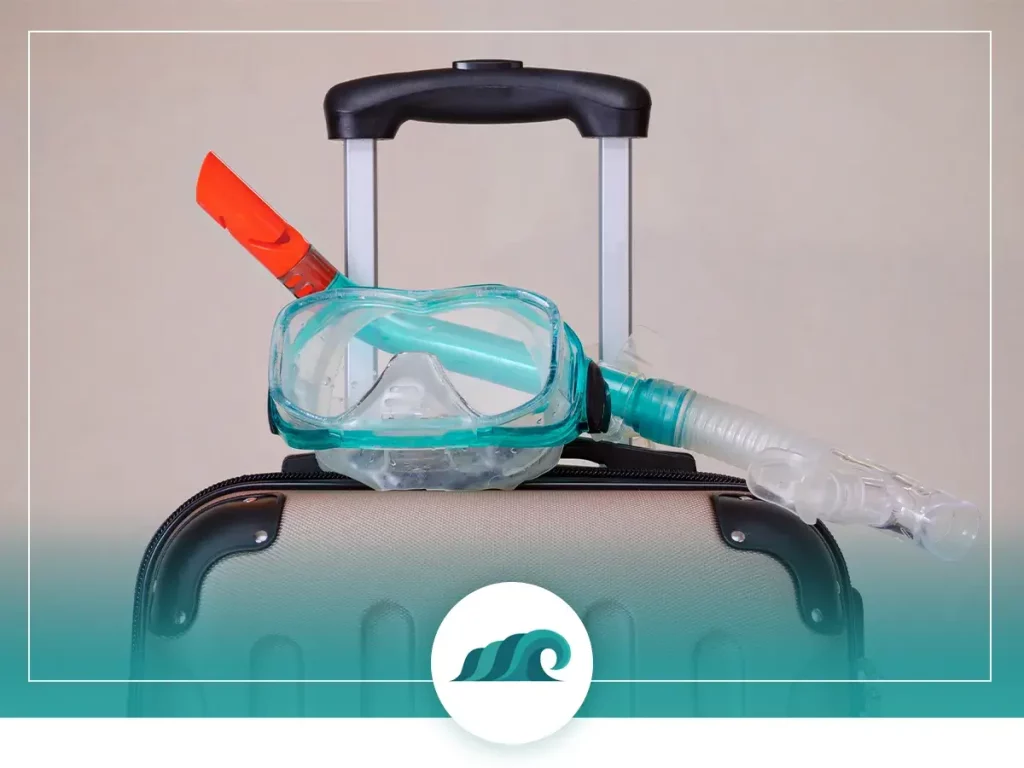 Can snorkel gear fit in carry-on luggage?