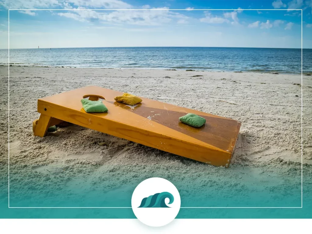 Playing cornhole on the beach